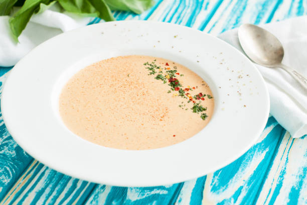 Creamy crab soup bisque with spices Creamy crab soup bisque with spices on wooden table Chowder stock pictures, royalty-free photos & images