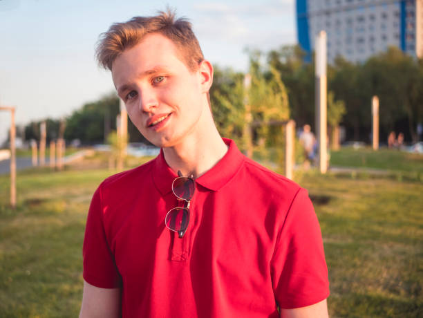 istock smiling attractive young man portrait with copy space 971209320