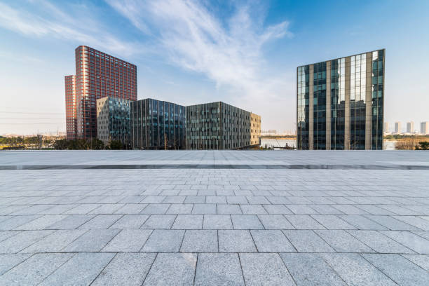 istock Panoramic skyline and modern business office buildings with empty road,empty concrete square floor 971222120