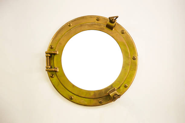 Old golden porthole with empty space inside circle Old golden porthole with empty space inside circle porthole stock pictures, royalty-free photos & images