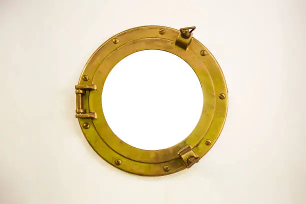 Old golden porthole with empty space inside circle