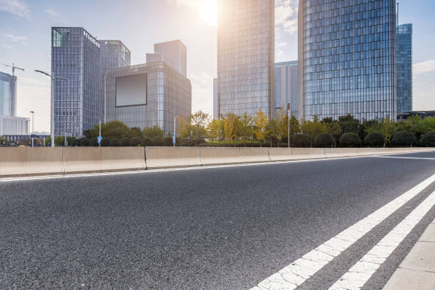 istock Panoramic skyline and modern business office buildings with empty road,empty concrete square floor 971227262