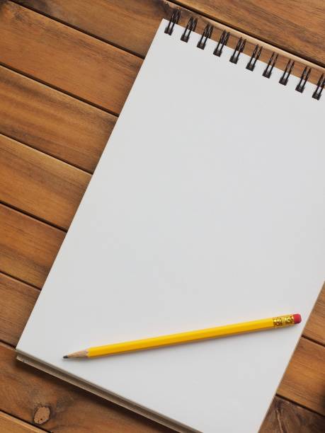 istock Sketch book, porcelain kettle, pencil 971227522
