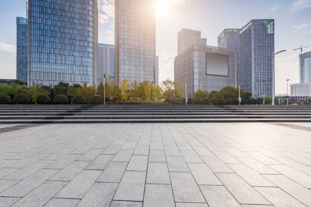 istock Panoramic skyline and modern business office buildings with empty road,empty concrete square floor 971227654