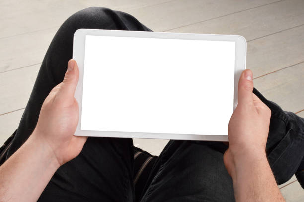 istock Male Hand Holding Digital Tablet with Clipping Path 971227890