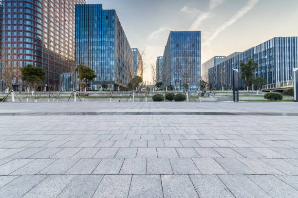 istock Panoramic skyline and modern business office buildings with empty road,empty concrete square floor 971230234