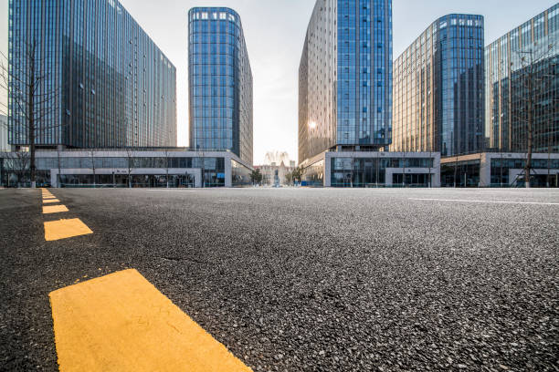 istock Panoramic skyline and modern business office buildings with empty road,empty concrete square floor 971230324