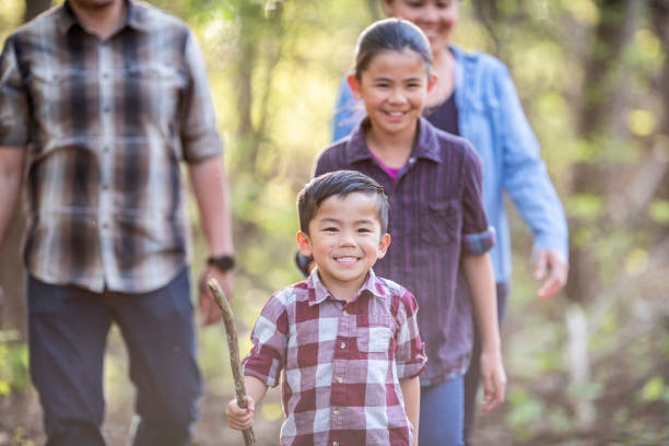 istock Family in the woods 971241028