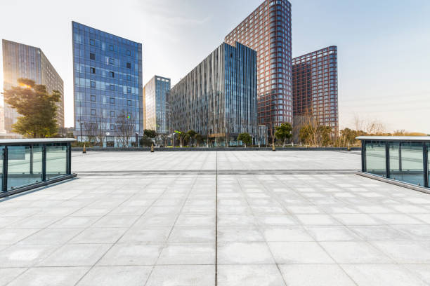 istock Panoramic skyline and modern business office buildings with empty road,empty concrete square floor 971241148