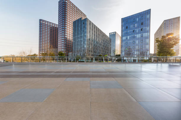 istock Panoramic skyline and modern business office buildings with empty road,empty concrete square floor 971241228
