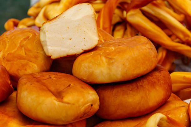 istock Different kinds of smoked cheese on a table 971244232
