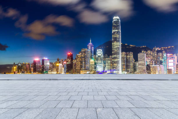 istock Panoramic skyline and modern business office buildings with empty road,empty concrete square floor 971246824