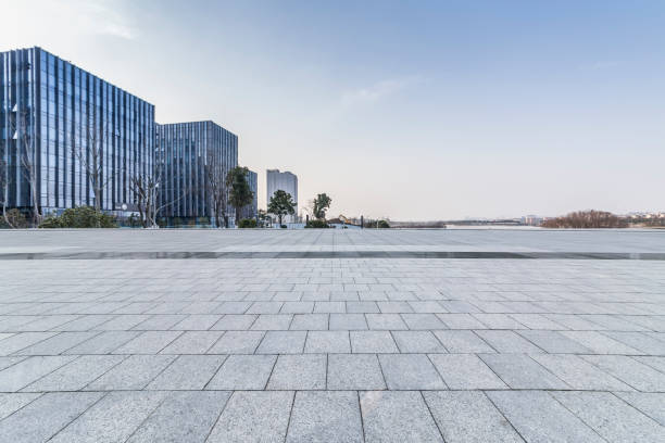 istock Panoramic skyline and modern business office buildings with empty road,empty concrete square floor 971246960