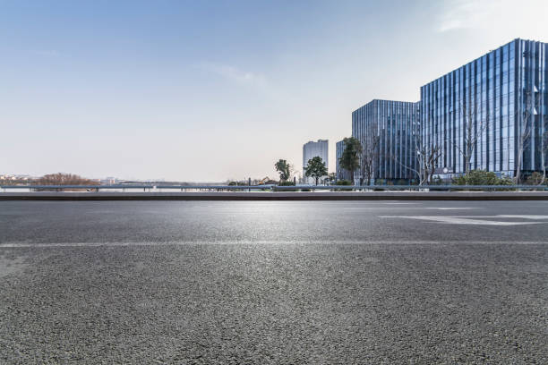istock Panoramic skyline and modern business office buildings with empty road,empty concrete square floor 971246966