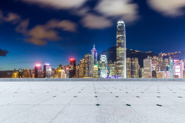 istock Panoramic skyline and modern business office buildings with empty road,empty concrete square floor 971247302