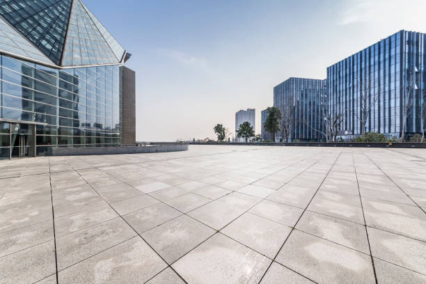 istock Panoramic skyline and modern business office buildings with empty road,empty concrete square floor 971250668