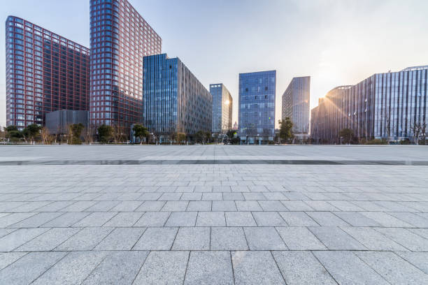 istock Panoramic skyline and modern business office buildings with empty road,empty concrete square floor 971256216