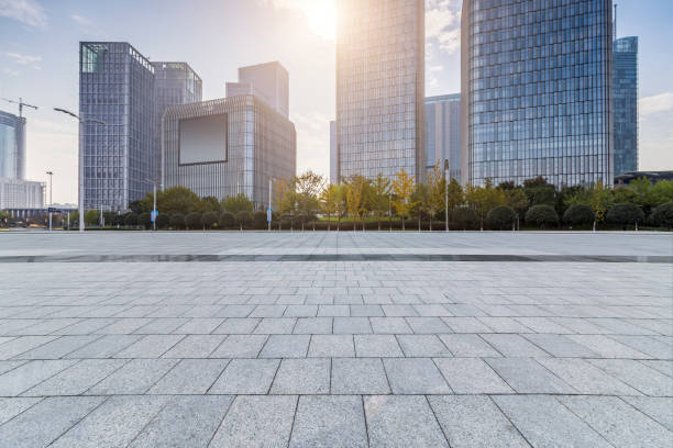istock Panoramic skyline and modern business office buildings with empty road,empty concrete square floor 971259190