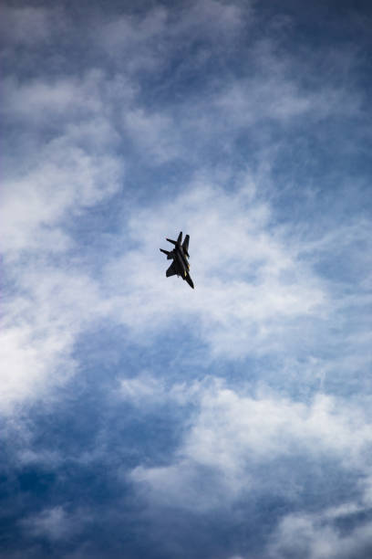 istock F-15 maneuvering against a moody sky 971275790