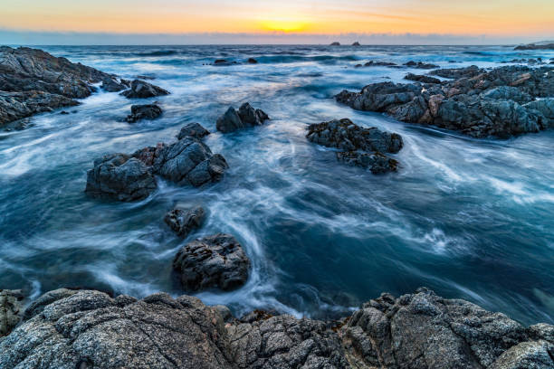 istock Turbulent water at sunset 971275960