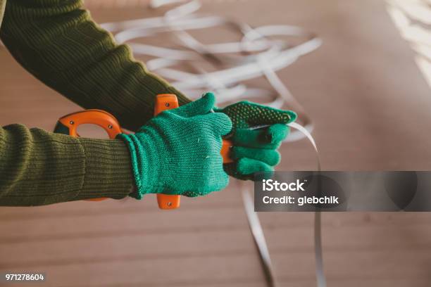 Hands In Gloves Twist The Geodetic Roulette Stock Photo - Download Image Now - Applying, Care, Centimeter