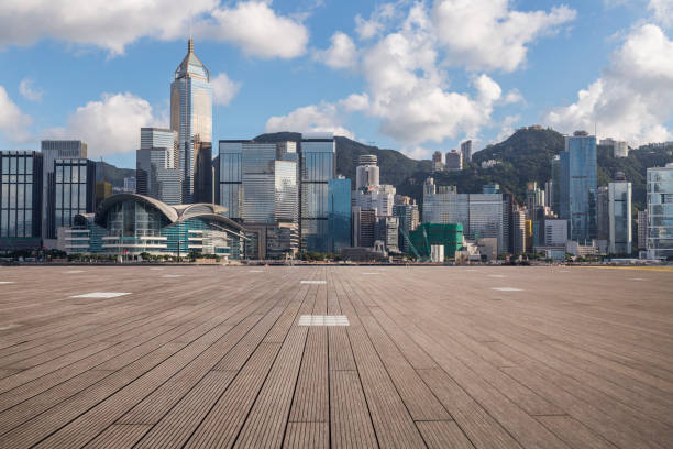 istock Panoramic skyline and modern business office buildings with empty road,empty concrete square floor 971286482