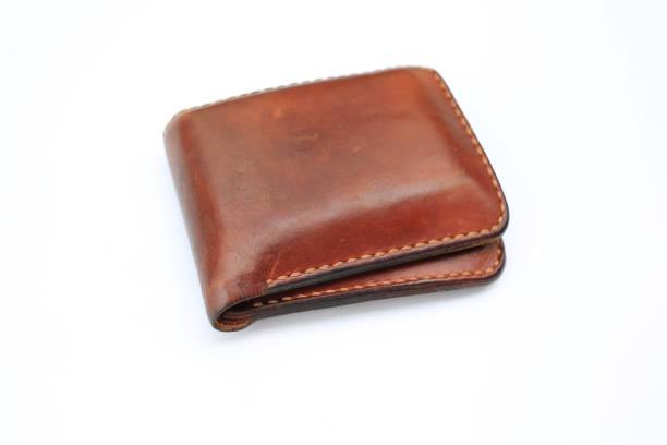 istock Brown leather wallet isolated on white background. 971286560
