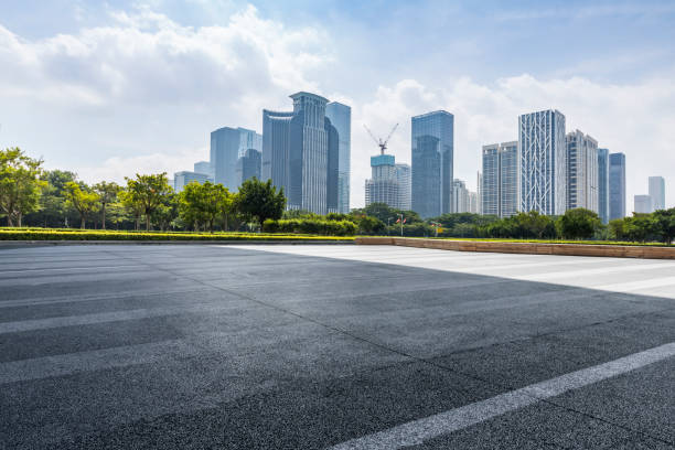 istock Panoramic skyline and modern business office buildings with empty road,empty concrete square floor 971288128