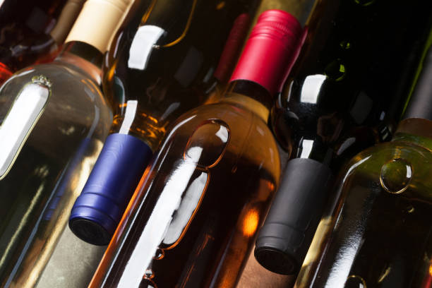 istock Red, rose and white wine bottles 971289524