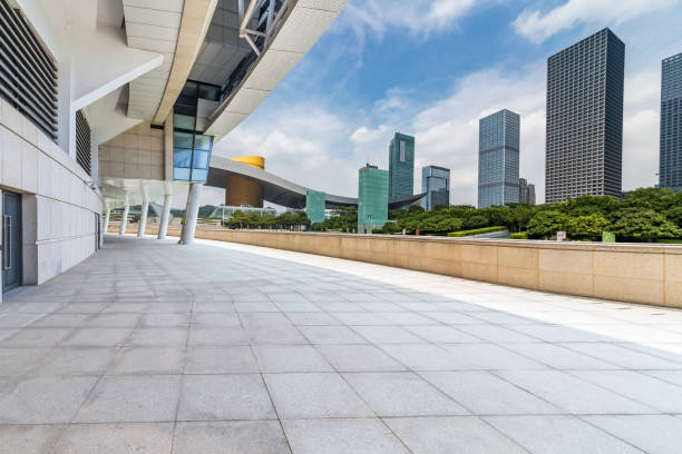 istock Panoramic skyline and modern business office buildings with empty road,empty concrete square floor 971295344