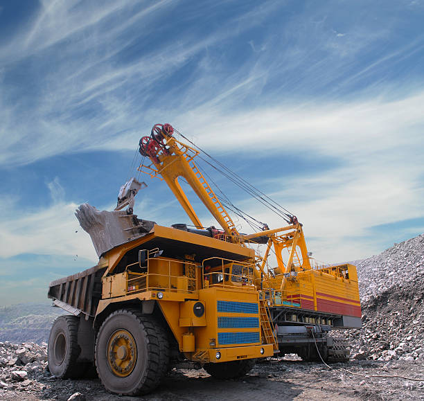 istock Heavy plant machinery loading iron ore in a quarry 97129570