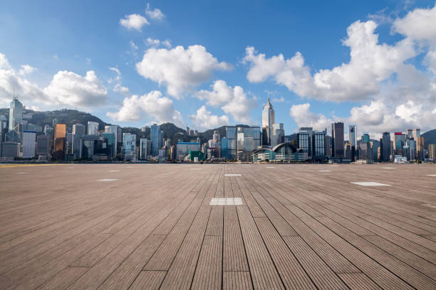 istock Panoramic skyline and modern business office buildings with empty road,empty concrete square floor 971295802
