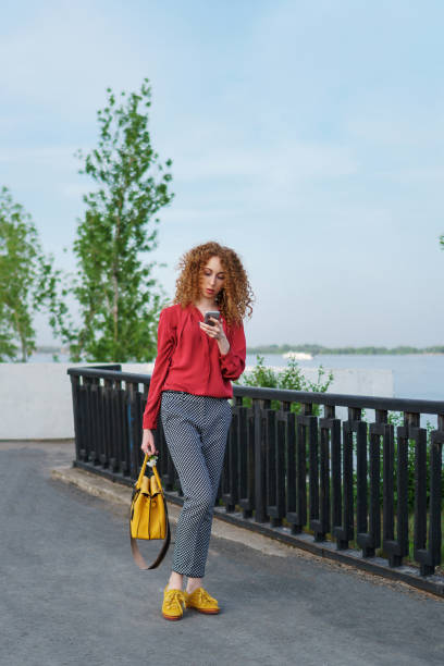 istock Girl with curly hair. Springtime 971301118