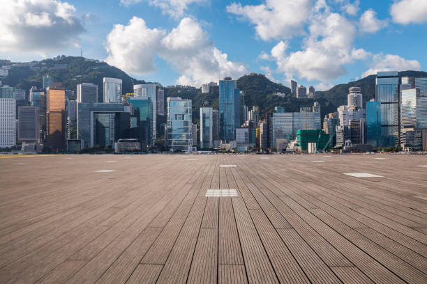 istock Panoramic skyline and modern business office buildings with empty road,empty concrete square floor 971301388