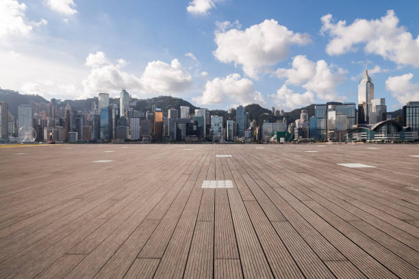 istock Panoramic skyline and modern business office buildings with empty road,empty concrete square floor 971301916