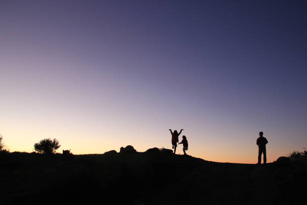 istock Three People Silhouette, New Zealand 971309410