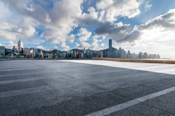 istock Panoramic skyline and modern business office buildings with empty road,empty concrete square floor 971322344