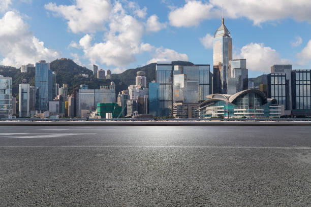 istock Panoramic skyline and modern business office buildings with empty road,empty concrete square floor 971332158