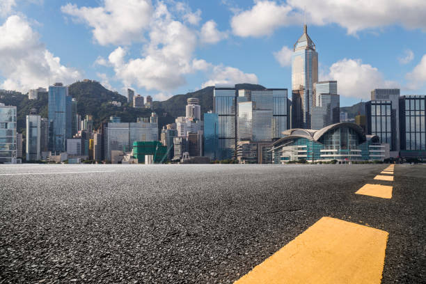 istock Panoramic skyline and modern business office buildings with empty road,empty concrete square floor 971332322