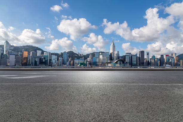 istock Panoramic skyline and modern business office buildings with empty road,empty concrete square floor 971332442