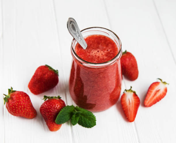 istock Jar with strawberry smoothie 971335054