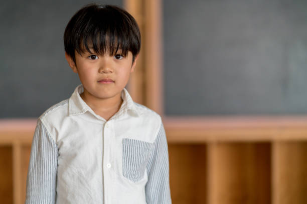 istock Portrait of a young school boy 971351054
