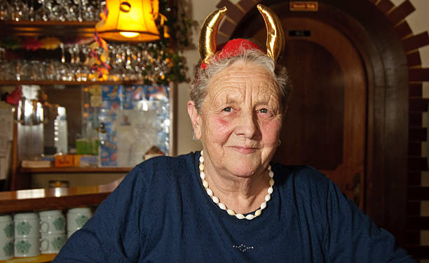 istock old woman dressed as a devil in the Carnival 97135341