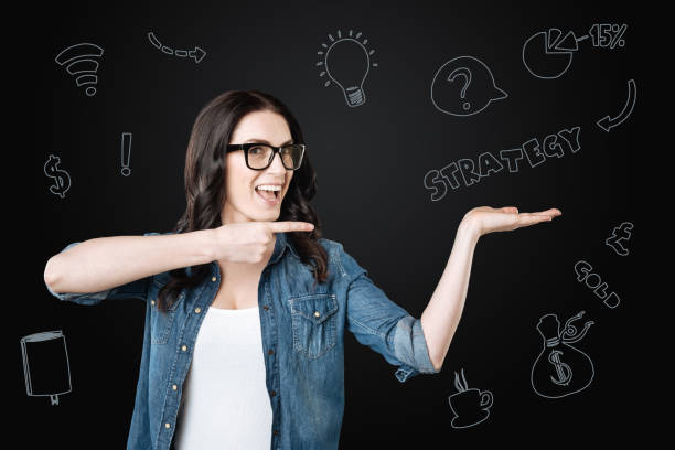 istock Happy woman smiling and talking about her strategy 971360320