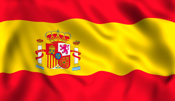 スペインのシンボルが風を振っているスペインの旗 - スペイン ストックフォトと画像