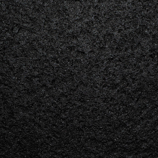 istock Black stone texture and seamless background 971366260
