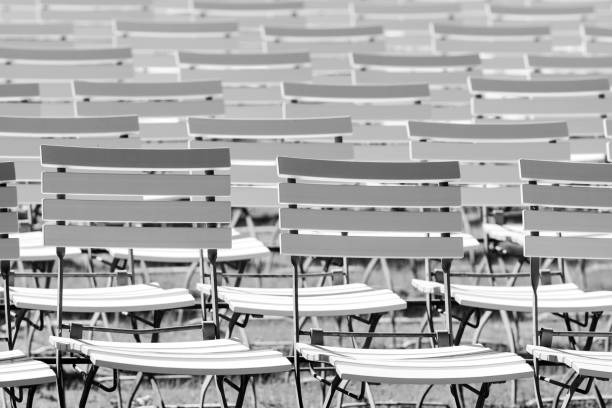 istock White chair rows in a spa park in Black & White 971370118