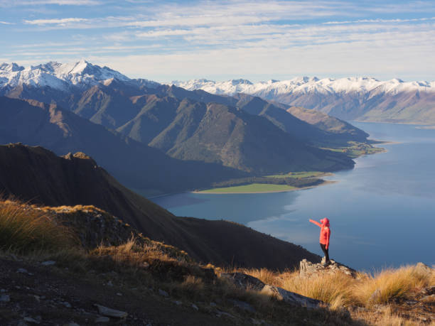istock Young woman viewing mountain landscape 971373152