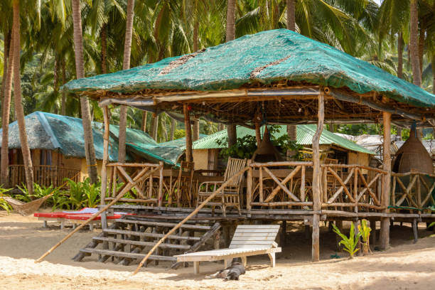 istock Tent on a sandy beach. Tropical beach. 971374070