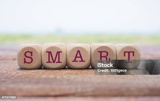 Smart Word Written On Cube Shape Wooden Blocks On Wooden Table Stock Photo - Download Image Now